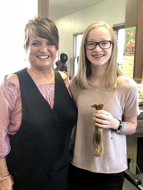 Loving granddaughter loses locks in honor of her Nana