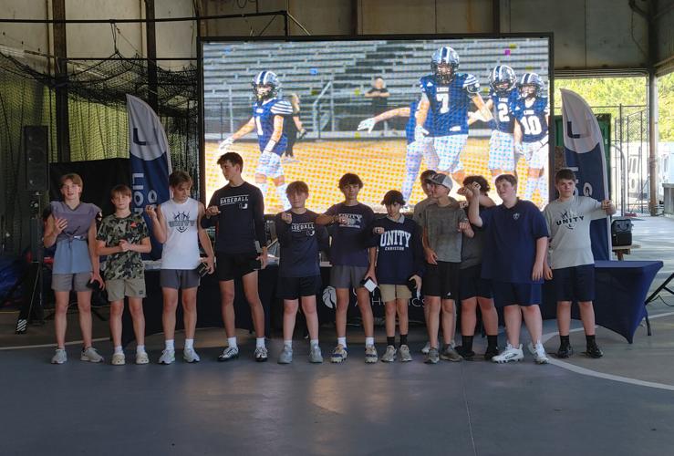 Unity Christian middle school players with rings