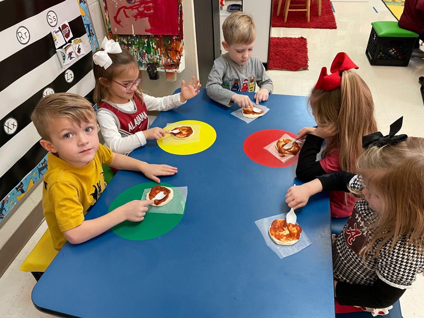Pepperell Primary students make their own pizza after reading 'The Little Red Hen Makes a Pizza'