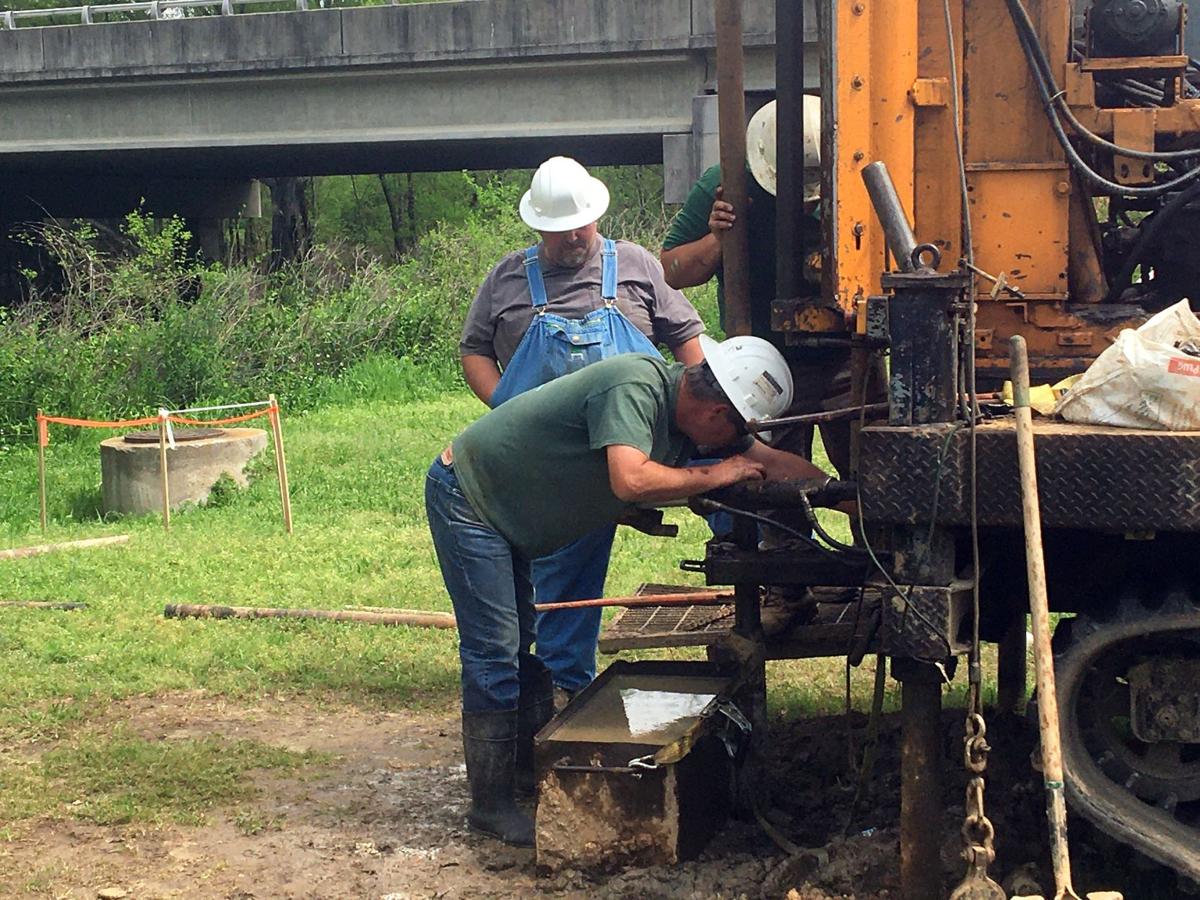 Sampling the soil for an Atlanta Gas Light gas line Business