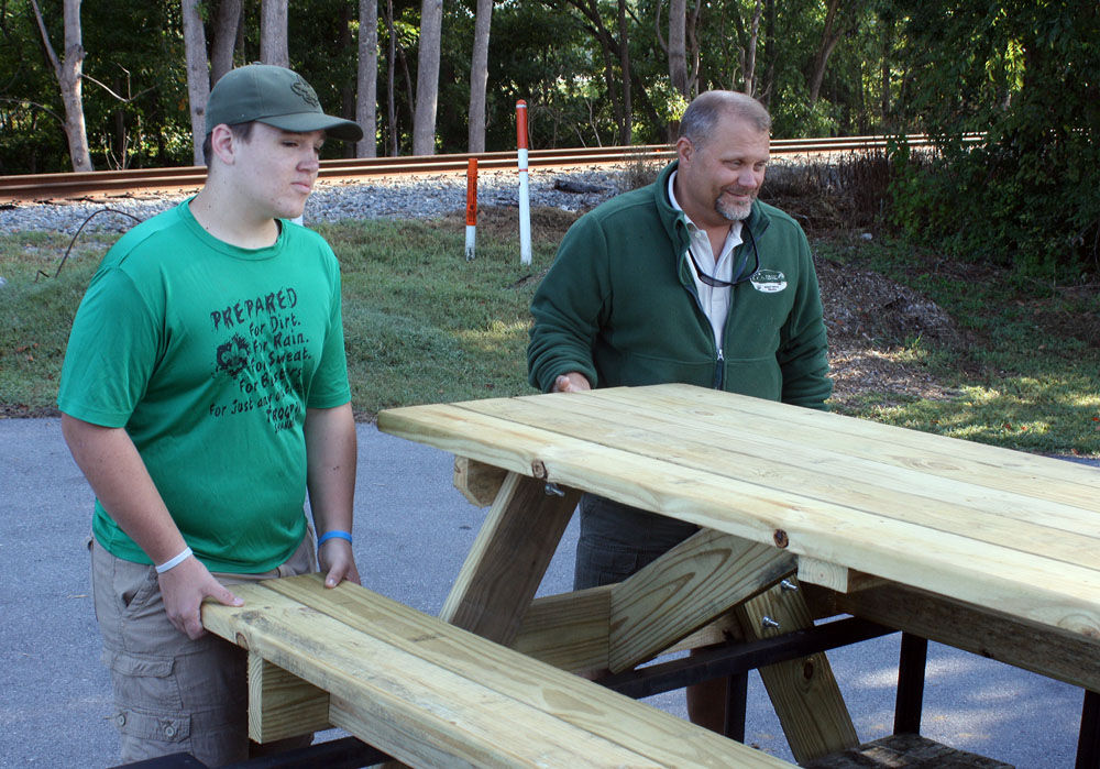 Scout donates tables