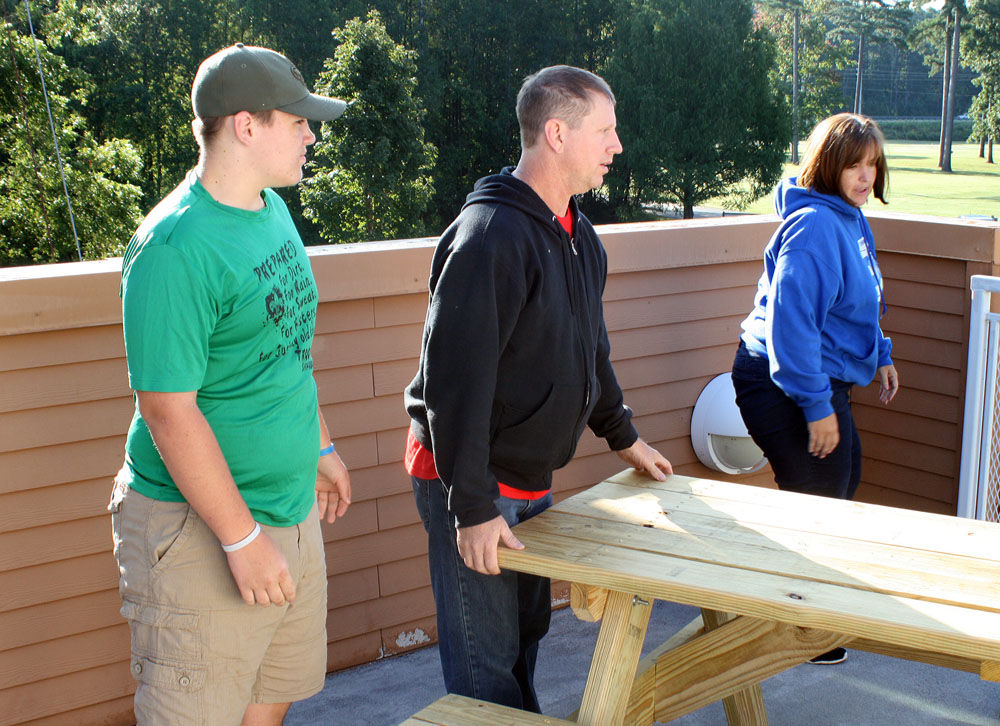 Scout donates tables
