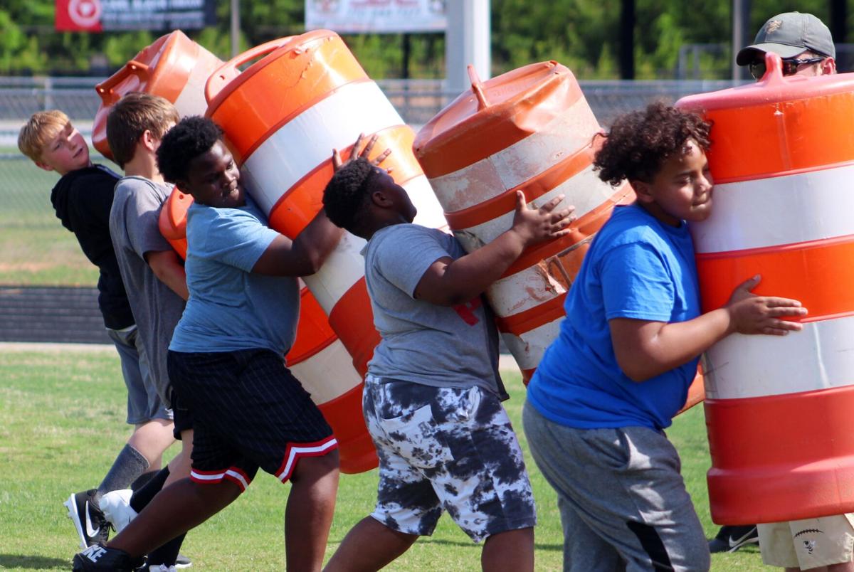 Rockmart Middle School football players put in work