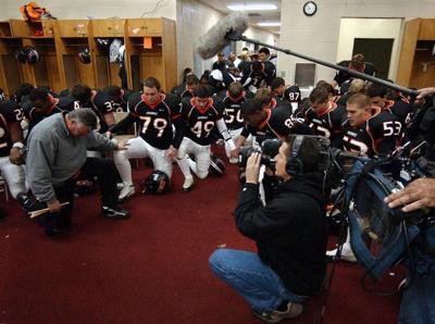 HOOVER MTV. Camera and sound crews follow Hoover High School football coach Rush Propst and his team at practices and games as well as other times for a reality show that could air on MTV later. This is from their quarterfinal playoff game against Tusca...