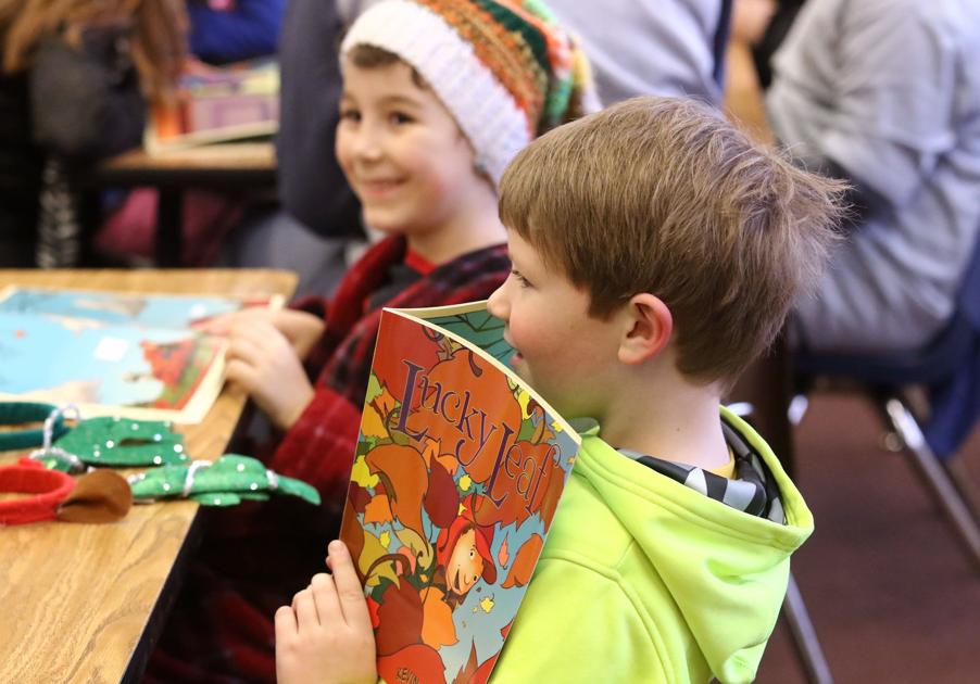 UCC women's basketball players read to Winchester Elementary first-graders on Friday