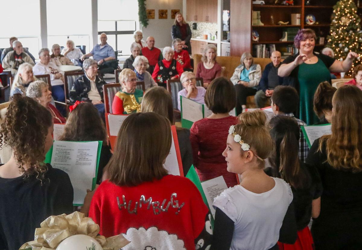 Fir Grove students entertain residents at Linus Oakes Education