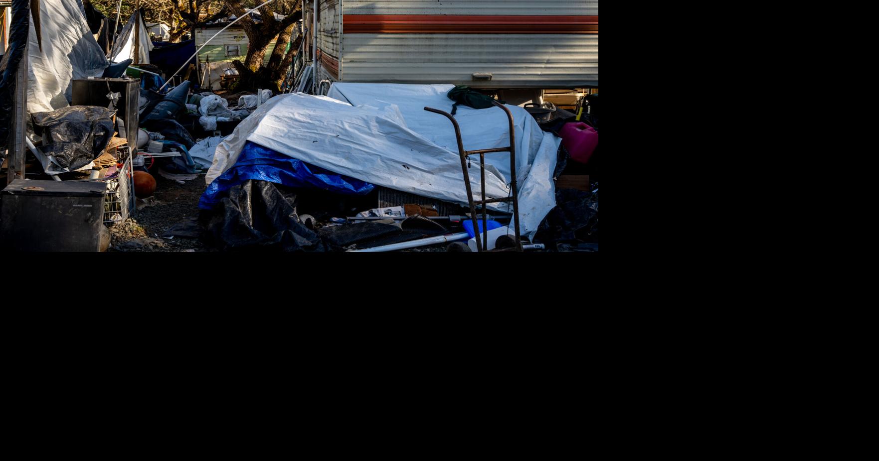 Neighbors take action to clean up illegal 'dump' near Riddle | Local ...