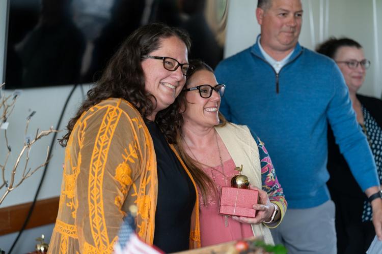 Teachers awarded golden apples for work in community Education