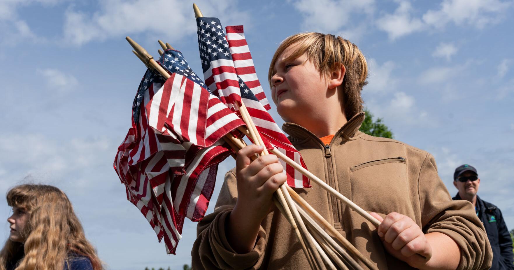Fir Grove Elementary students plant flags at VA Cemetery ahead of Memorial Day - Vimarsana News
