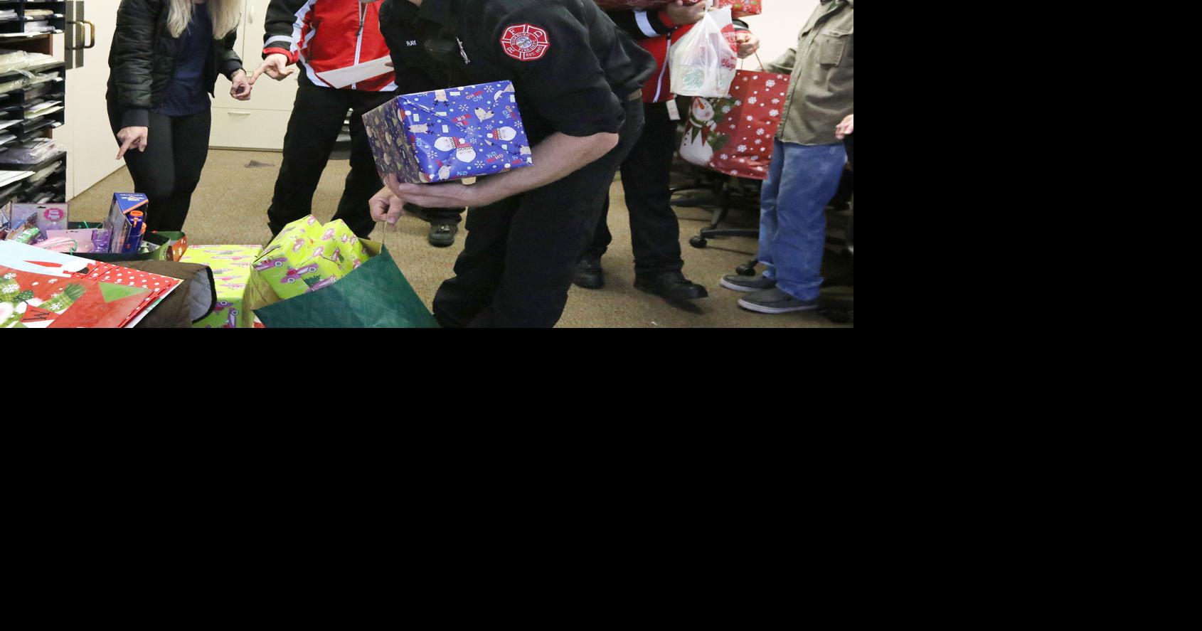 Volunteers bring Christmas cheer to families struggling with cancer ...