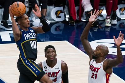 Pacers burned by the Heat in Oladipo's return