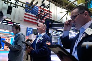 Stocks rise on Wall Street while crude oil prices fall for the first time in a week