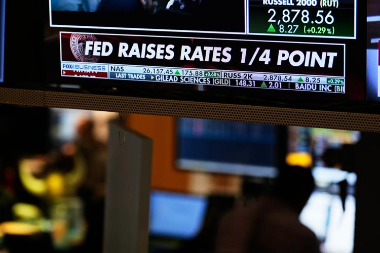 Stocks and bonds rally after Fed hikes rates and oil prices fall