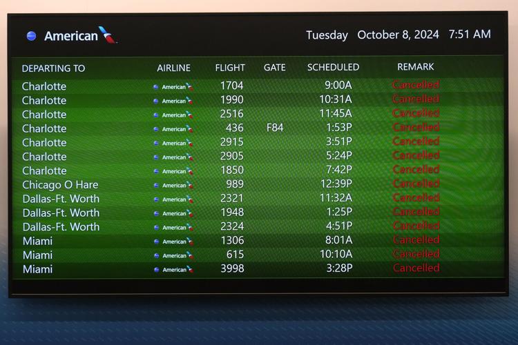 Airlines say they're capping fares in the hurricane's path as Biden