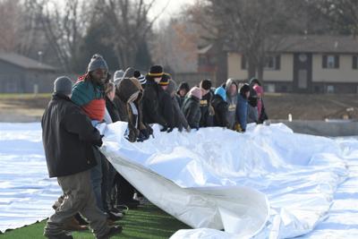 Dordt University volunteers readying dome fabric