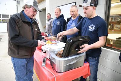 Firefighters thank farmers with steak supper