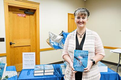 Jen Porter with book, "The Frozen"