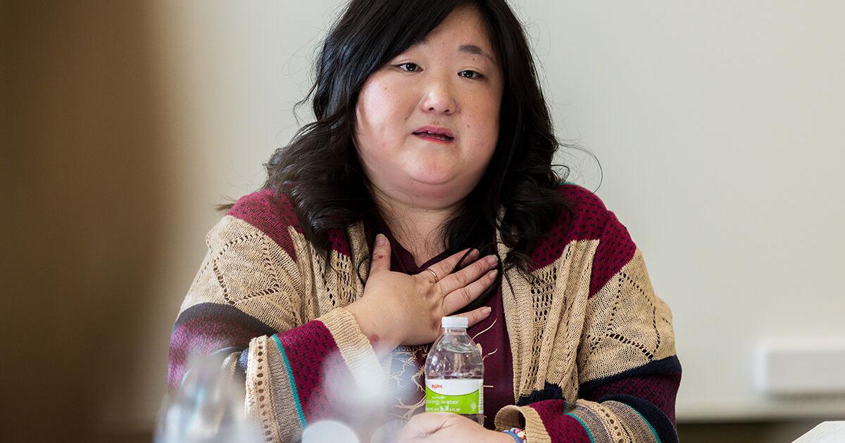 North Star Advocacy Center employee gives speech detailing experience learning about immigration