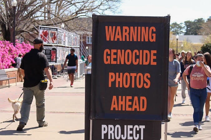 Warning Genocide Sign