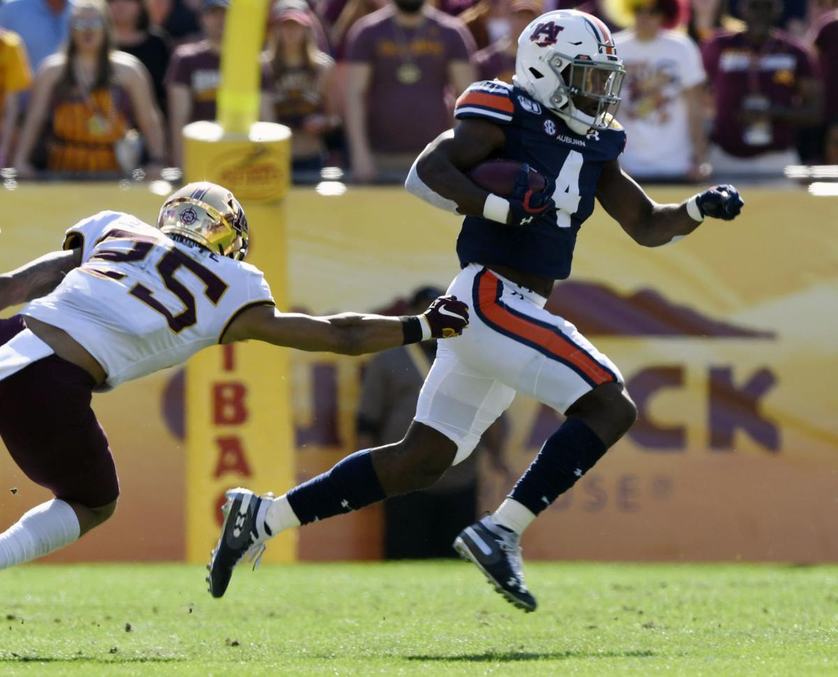 Auburn's Noah Igbinoghene picked No. 30 overall by Miami Dolphins