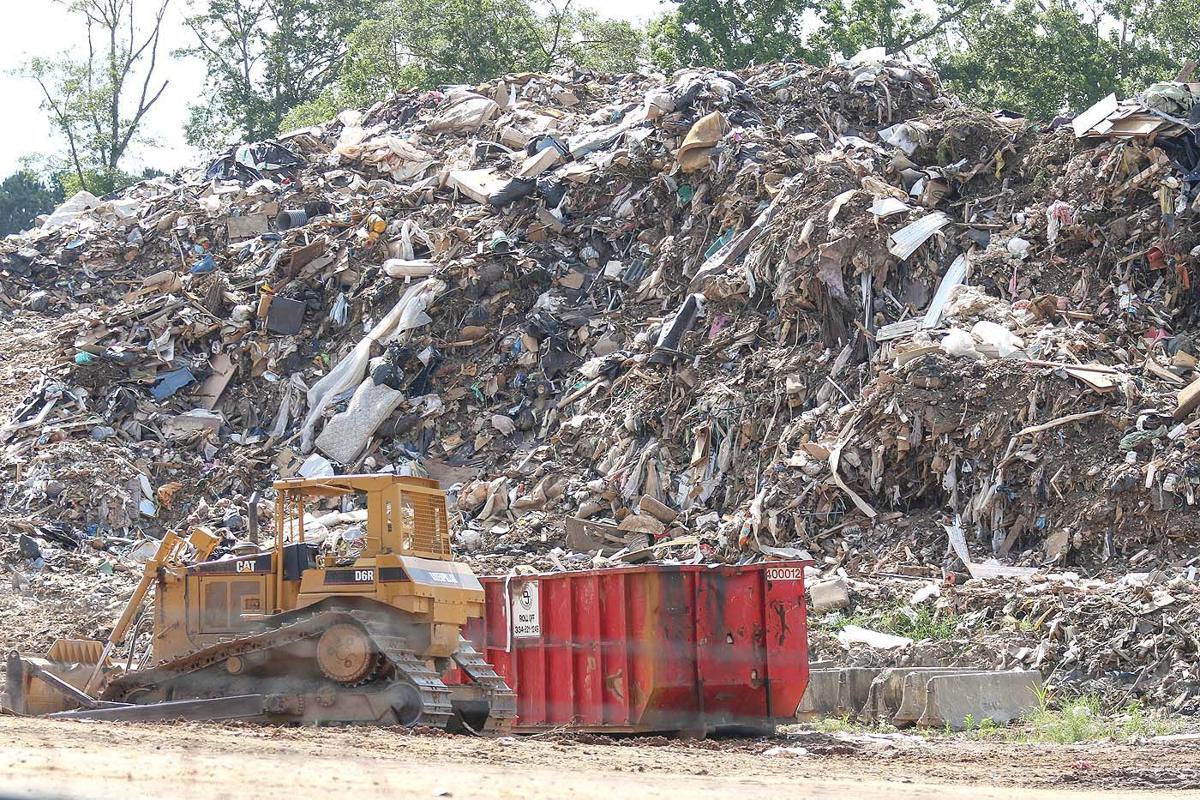 Watch now Neighbors help Auburn man fight dump site Local News
