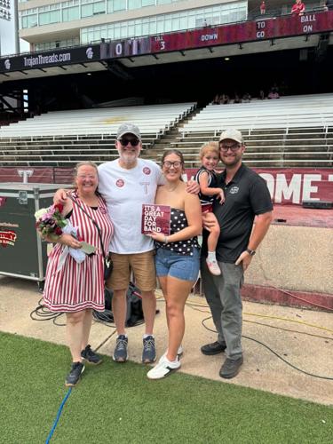 Marching band alumni return for reunion weekend, recognize Walker’s 25 years at TROY
