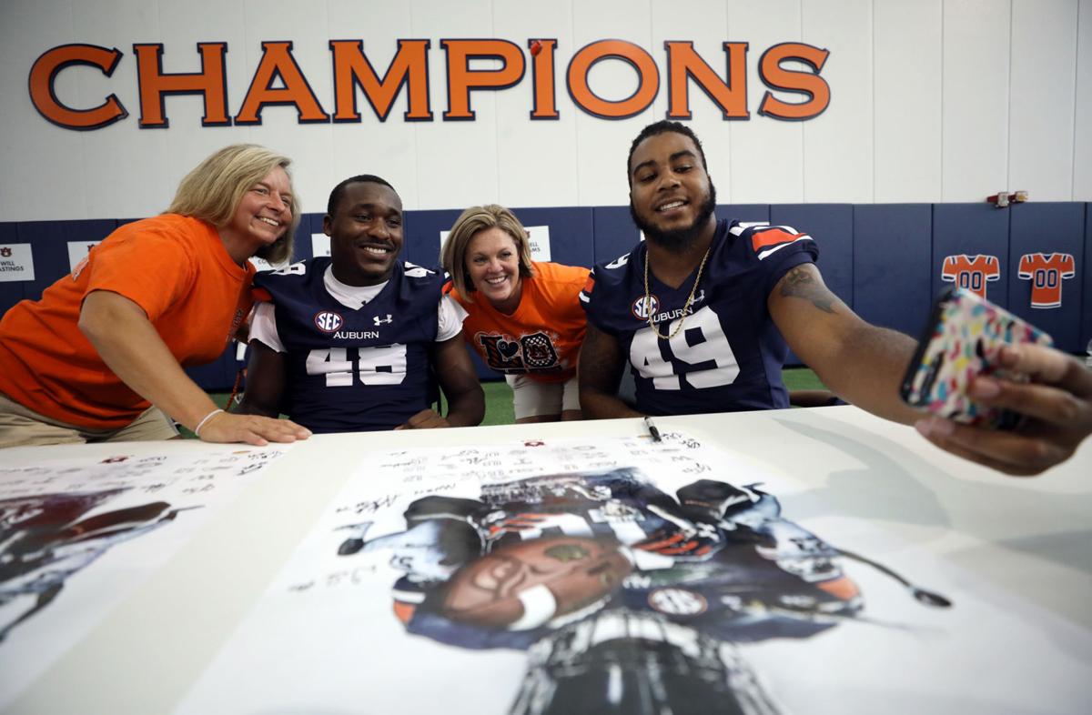 Auburn athletes revel in meeting supporters at Fan Day