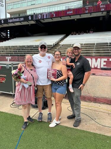 Marching band alumni return for reunion weekend, recognize Walker’s 25 years at TROY