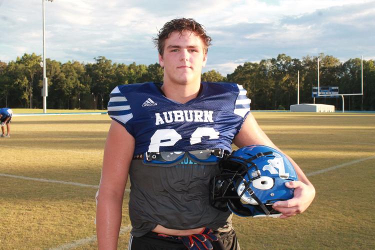Auburn High’s Brandon Crum feels at home back on defensive line