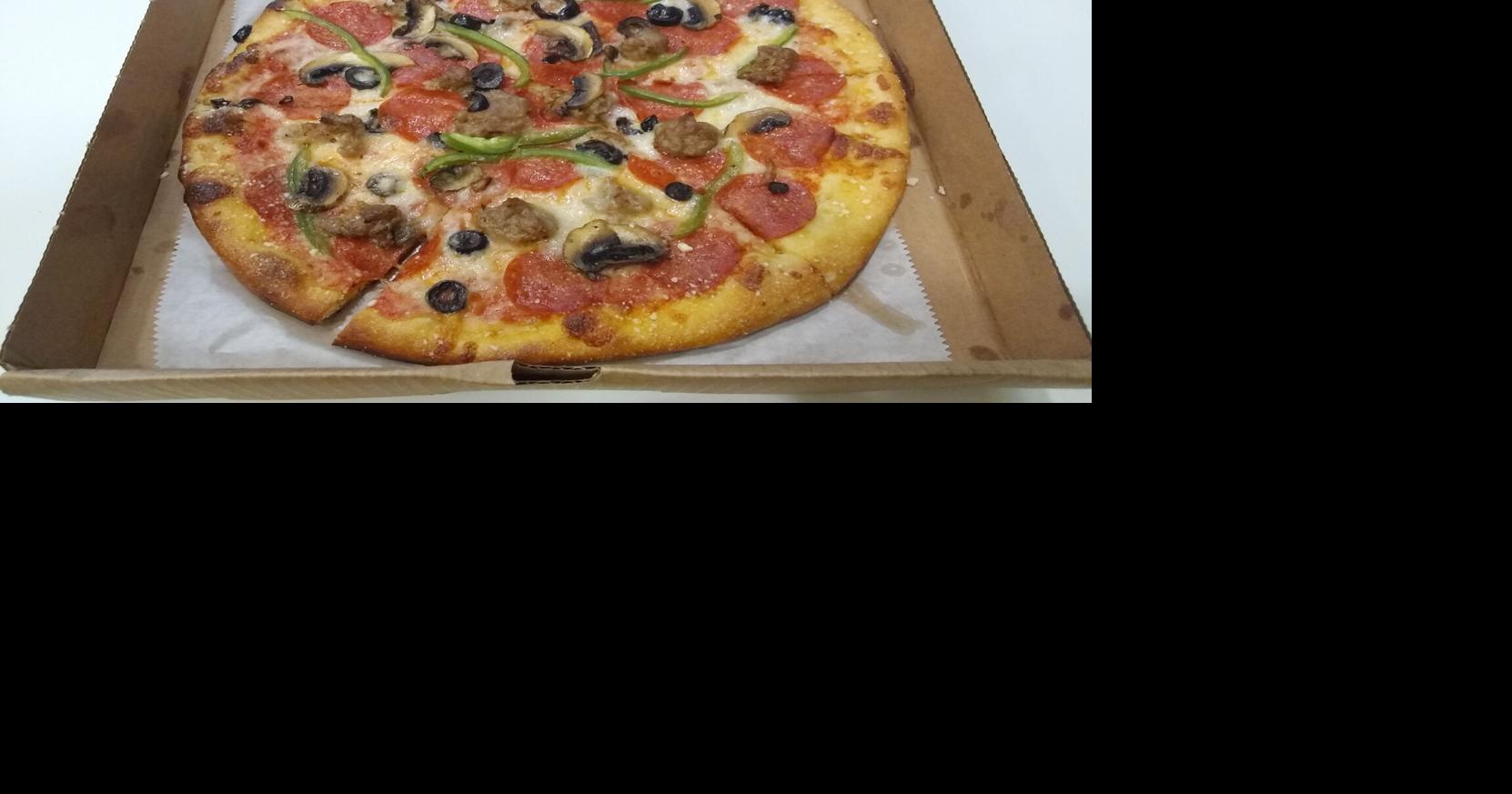 Find topnotch pizza at Dough Pizzeria