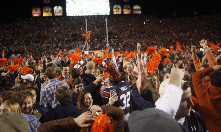 AUBURN FOOTBALL: Fans rush field in celebration of Iron Bowl win