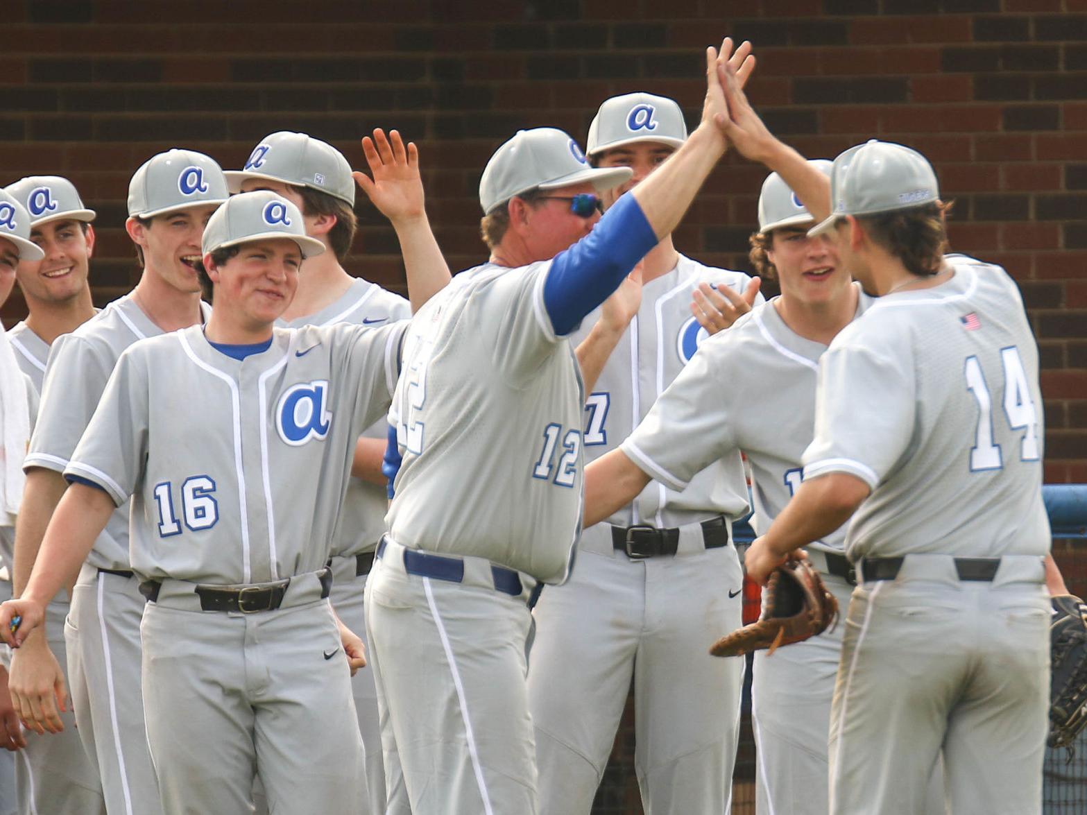 In March 8, Auburn High won a Saturday baseball game, and then ...