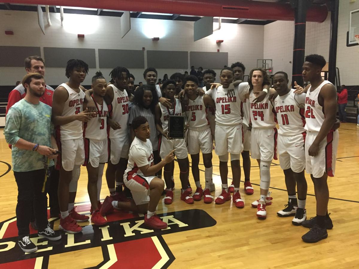 Opelika boys, girls basketball claim area tournament titles High