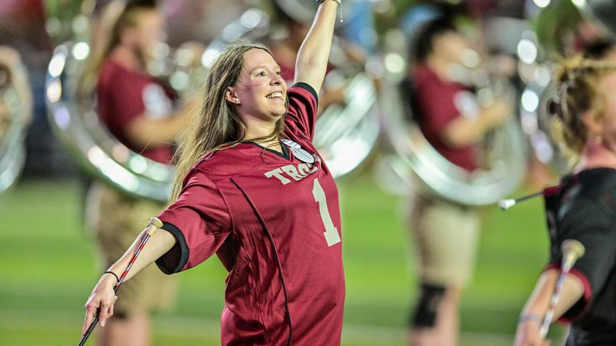 Marching band alumni return for reunion weekend, recognize Walker’s 25 years at TROY