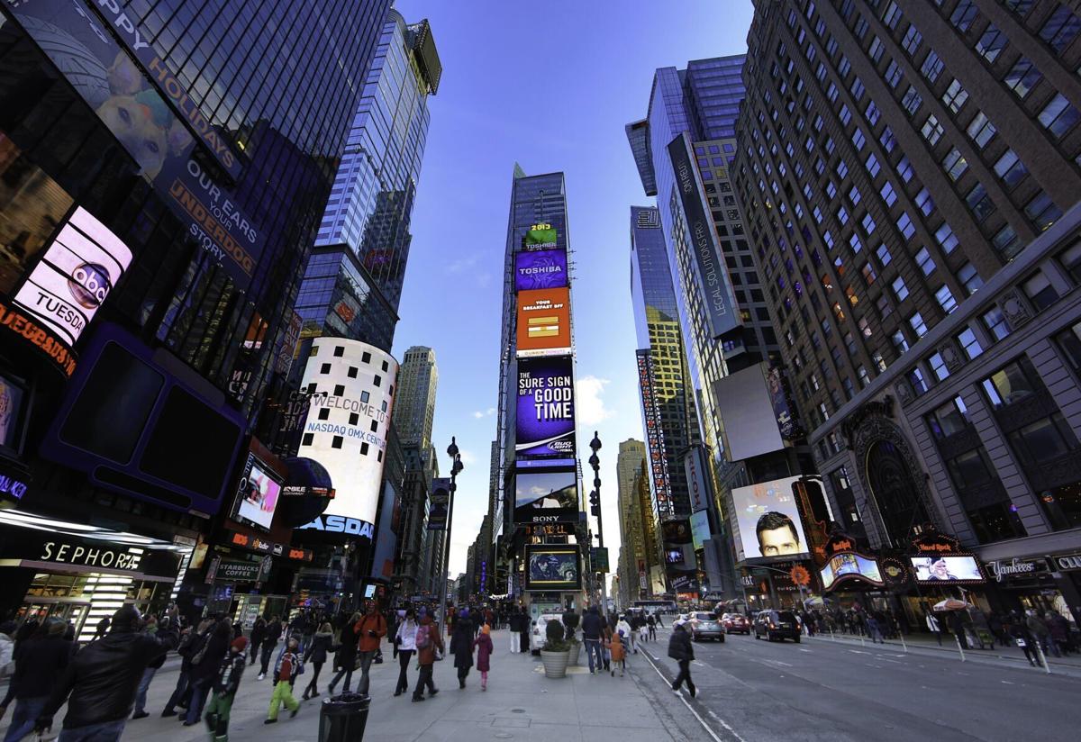 A view of Times Square in New York City. The New Year's celebration in Times Square was cut back last year, but this Dec. 31 New York City is restoring the event back to its former glory. Only those who are vaccinated against COVID-19 can attend, however.