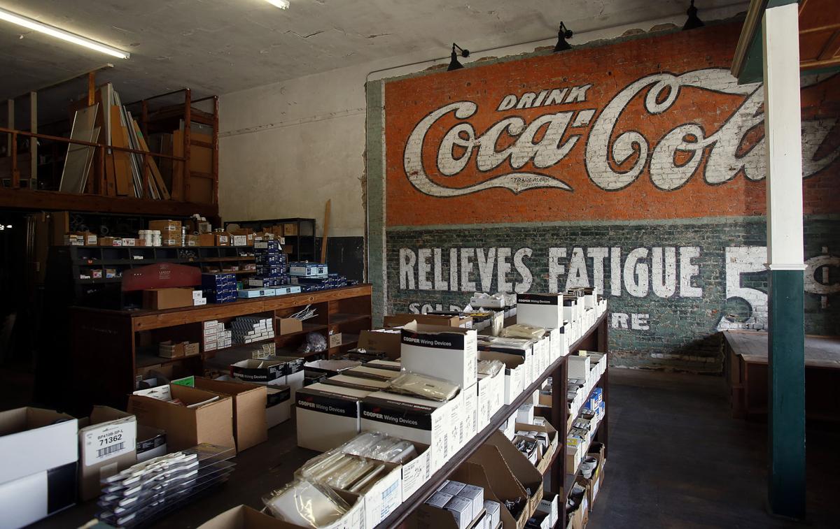 Smith T discovers centuryold CocaCola mural behind wall of Opelika