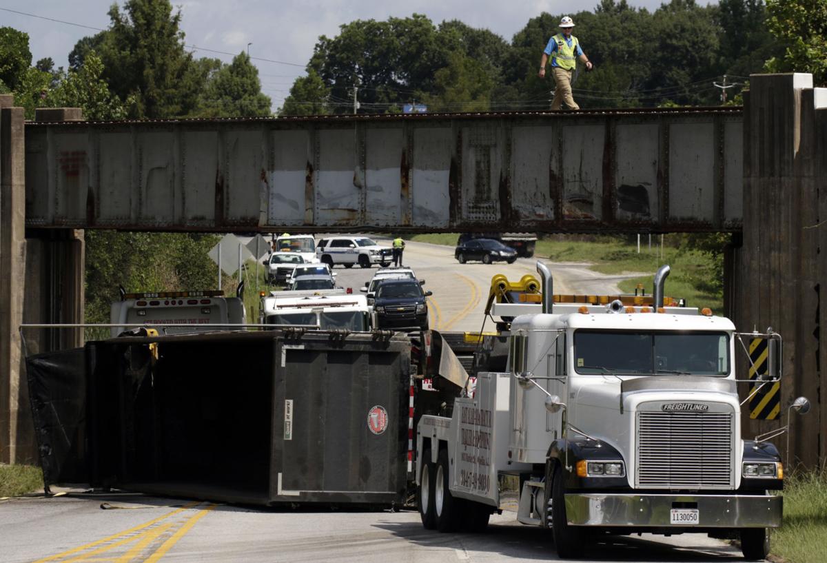 Tractortrailer accident affects railroad overpass in Opelika