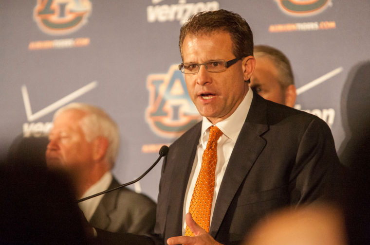 AUBURN FOOTBALL Recruits feel at home with new coaching staff Auburn