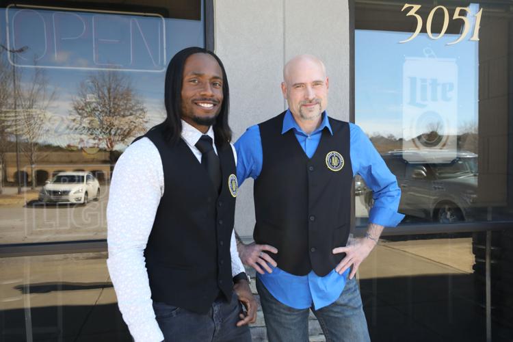 The fist and the glove Auburn Billiards’ two different coowners