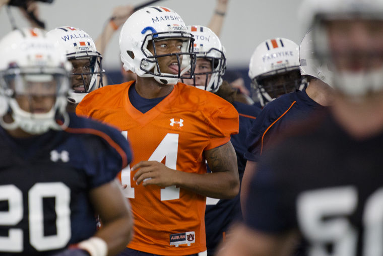 Auburn's Nick Marshall moving from quarterback to cornerback for