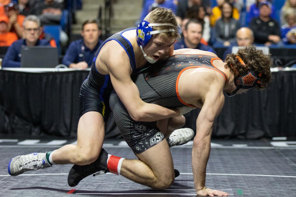 Photos Preliminary And Quarterfinal Rounds Of Big 12 Wrestling Championship Gallery 