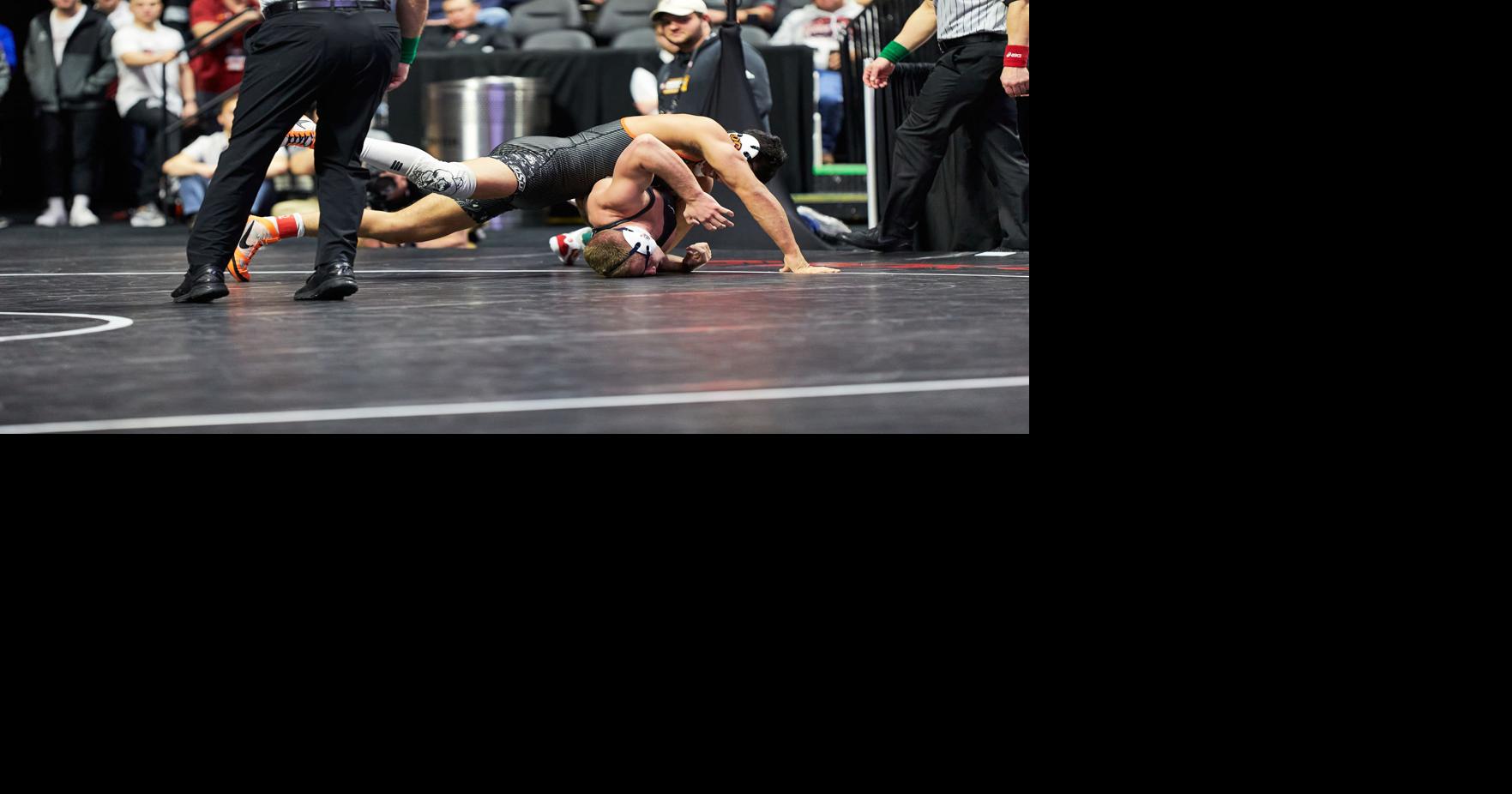 PHOTOS Day 1 of Big 12 Wrestling Tournament
