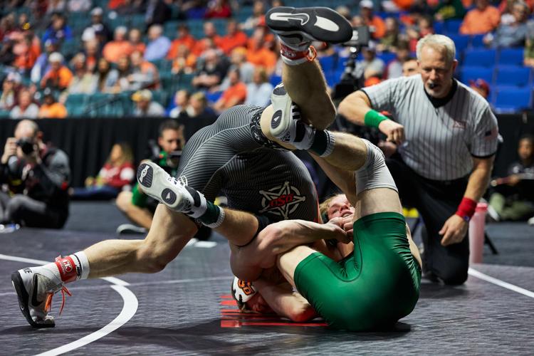 PHOTOS Day 1 of Big 12 Wrestling Tournament