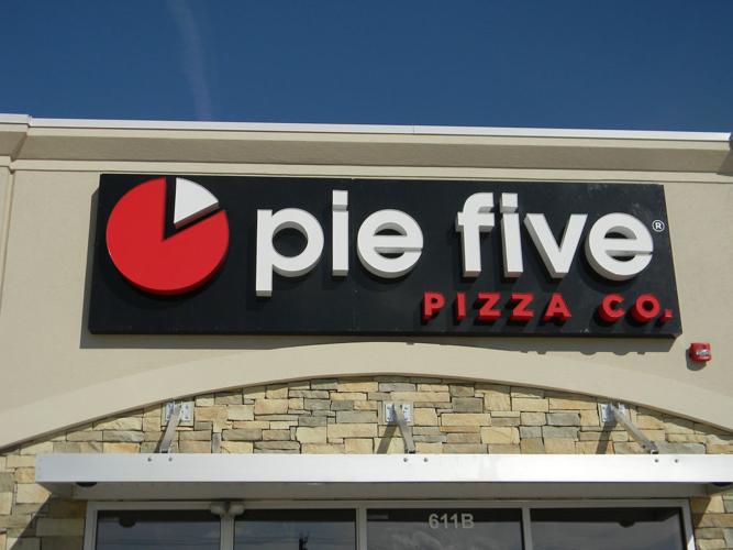 Reviving an old connection Former OSU football players open pizza restaurant News