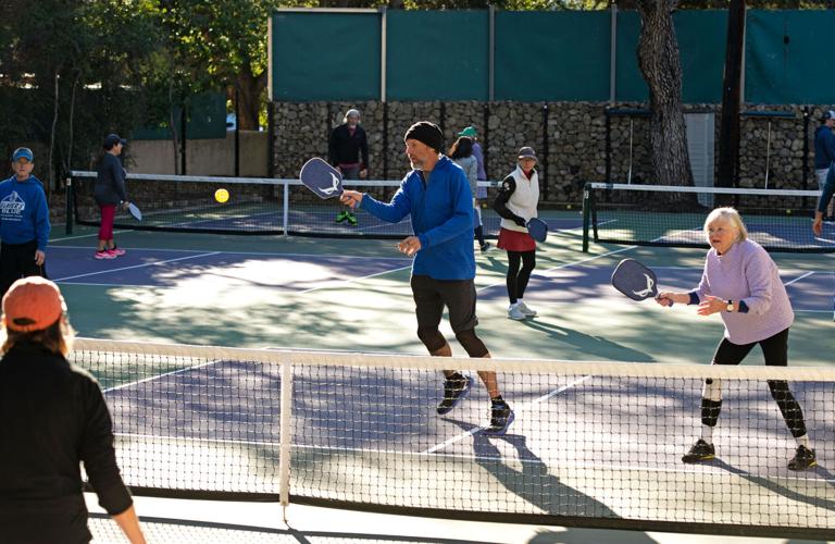 Quiet pickleball paddles in use at city courts Sports