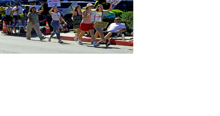 Ojai women protest Supreme Court decision overturning Roe v. Wade during the parade - Vimarsana News