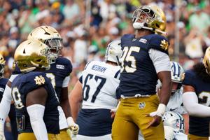 Notre Dame defensive lineman Bryce Young (95) celebrates after getting a stop during a NCAA football game against Rice at Notre Dame Stadium on Saturday, Sept. 12, 2026, in South Bend.