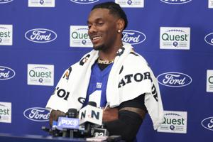 Jul 23, 2025; East Rutherford, NJ, USA; New York Giants wide receiver Malik Nabers (1) talks with media during training camp at Quest Diagnostics Training Center. Mandatory Credit: Vincent Carchietta-Imagn Images
