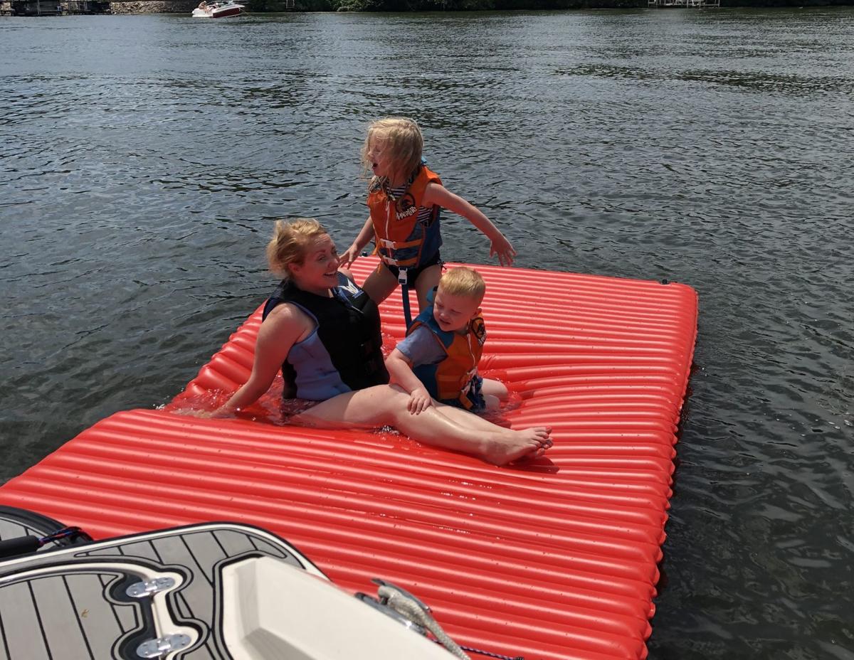 Kristine Rohwer with kids at the lake