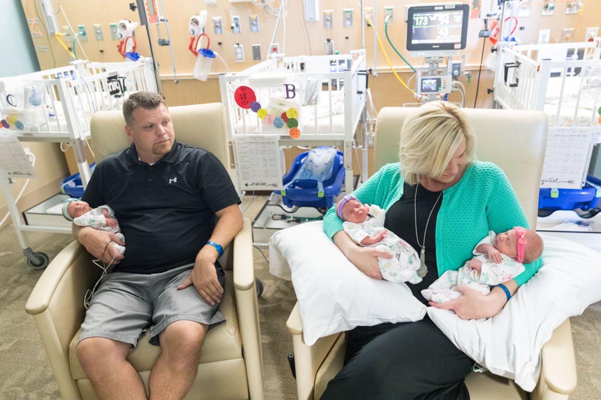 'It just blew our minds': Identical triplets born to Nebraska couple are one in a million